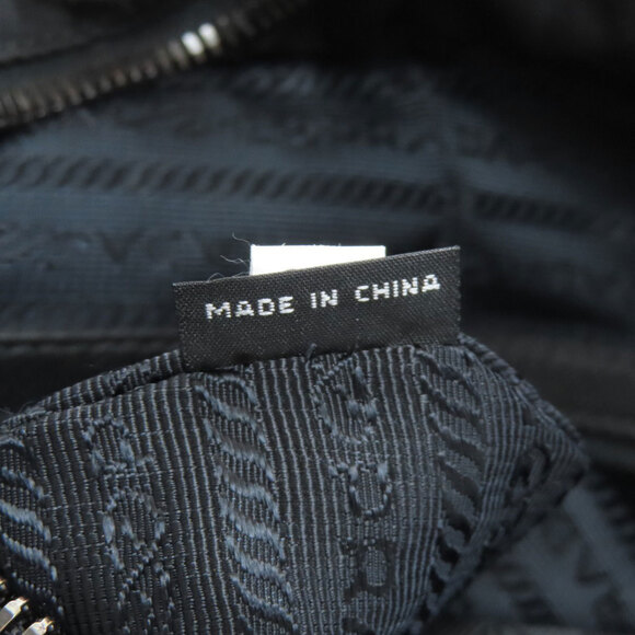 Prada quilted shoulder bag in nylon for women